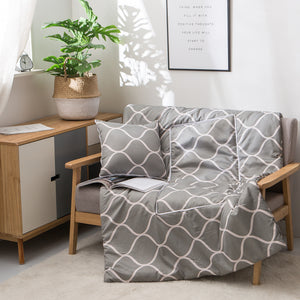 grey geometric throw pillow and quilt