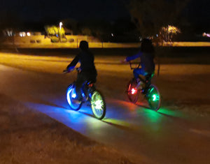 riding bike at night safely with cool wheel lights